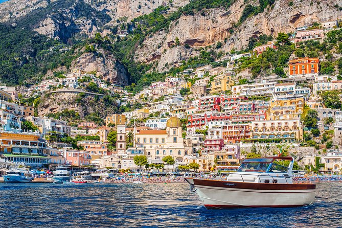 Amalfi Coast Boat Tour With Pickup from Sorrento Area Hotels - Captain commentary and the view from the right side of the boat
