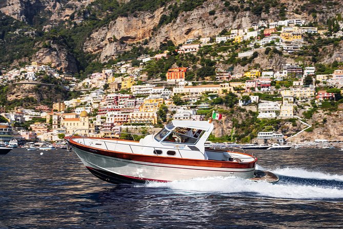 Amalfi Coast Boat Tour With Pickup from Sorrento Area Hotels - Amalfi Coast icons at sea: Saracen Towers and Li Galli Island