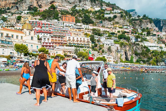 Amalfi Coast Boat Tour With Pickup from Sorrento Area Hotels - Town time in Amalfi: walking streets, quick lunch, and photo stops