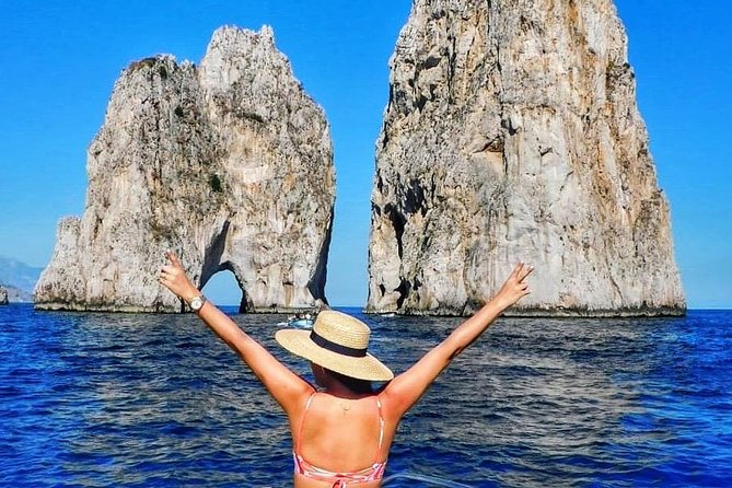 Capri and Positano private boat tour - Capri by sea: caves, Faraglioni, and real swim time