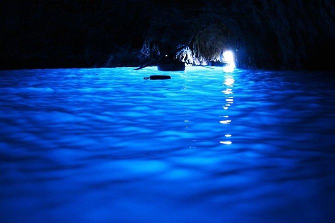 Capri & Blue Grotto Semi Private Boat Day Trip from Sorrento - On board: snacks, drinks, swimming stops, and snorkeling gear