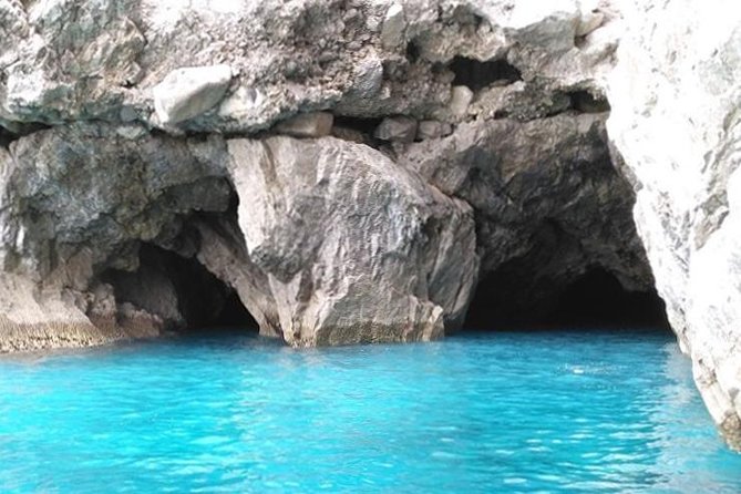 Capri Boat Tour from Sorrento: Swim, Grottos & Light Lunch - Faraglioni, Villa Malaparte, and Punta Carena: the postcard lineup