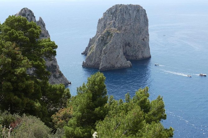 Capri Day and Night from Sorrento Small Group Tour - Sunset Cruise Highlights: Punta Campanella, Waterfall Photos, and Faraglioni