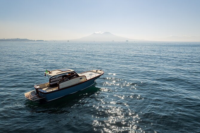 Capri First to Blue Grotto Semi Private Boat Tour from Sorrento - The island cruise: green, white caves, and the Faraglioni