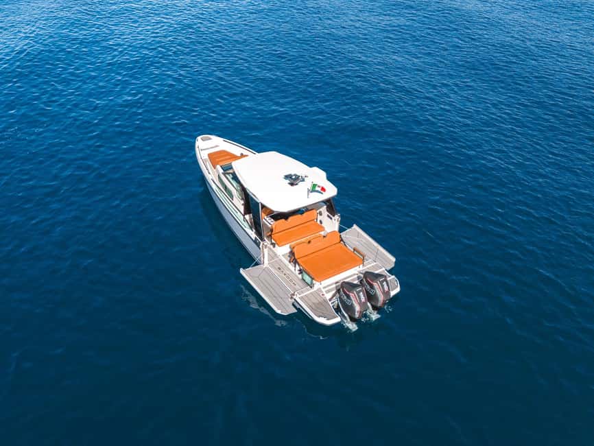 CAPRI: FULL DAY PRIVATE BOAT TOUR ON LUXURY TENDER - From Nonna Emilia to Marina Grande, then cruising the Sorrento coast
