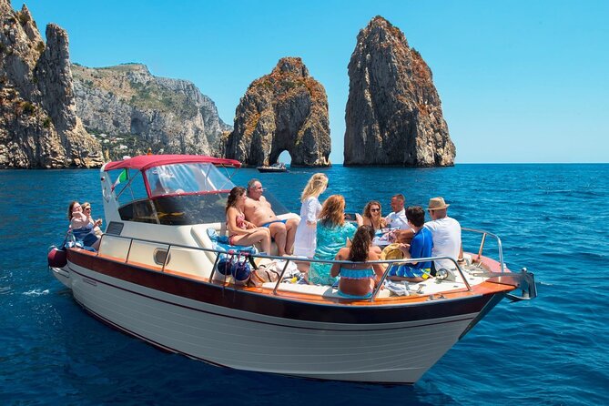 Capri Guided Boat Experience with Island Exploration and Transfer - Cruising the southwest: Punta Carena lighthouse stop