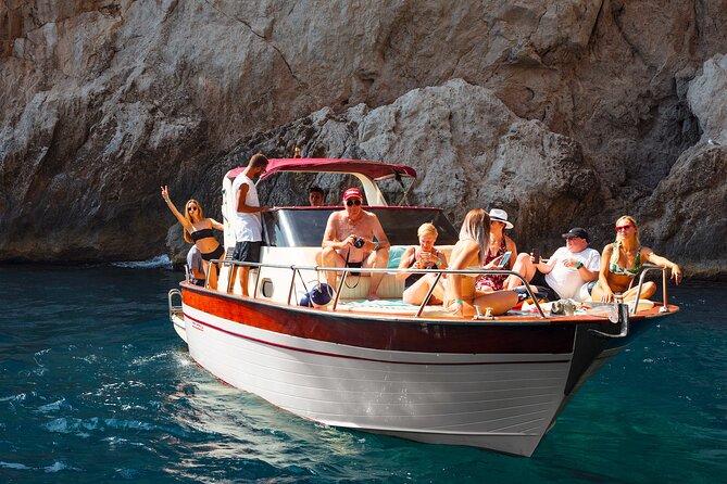 Capri Guided Boat Experience with Island Exploration and Transfer - Natural Arch on the eastern coast