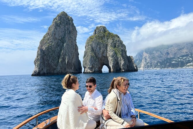 Capri in a Day All Inclusive Premium Boat Tour + City Visit - Swim and snorkeling stops: where to expect water time
