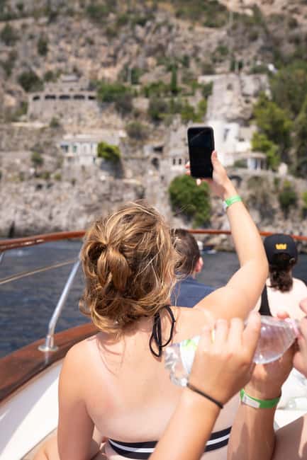 Capri Island Private Day Cruise : from Sorrento - The morning cruise: Queen Giovanna and Faraglioni from the water