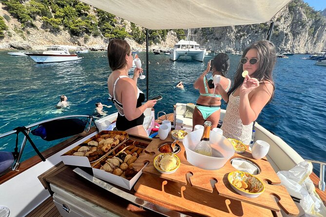 Capri Premium Boat Tour and City Visit Free Bar and Aperitif - White and Red Grotto color stops: two more cave interiors