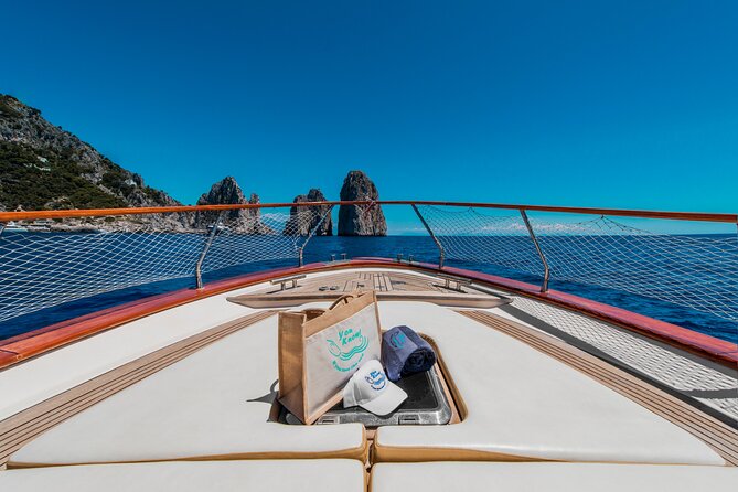 Capri Private Boat Day Tour from Sorrento, Positano or Naples - Cruising the Capri coastline: Marina Piccola to Faraglioni