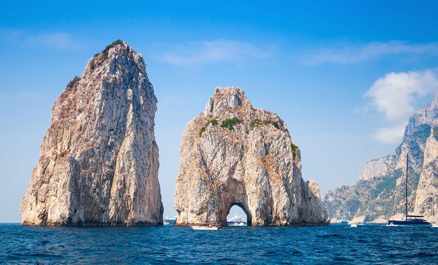 Capri Private Full-Day Boat Tour from Sorrento - Marina Piccola and Punta Carena Lighthouse: sailing near the rich-yacht world