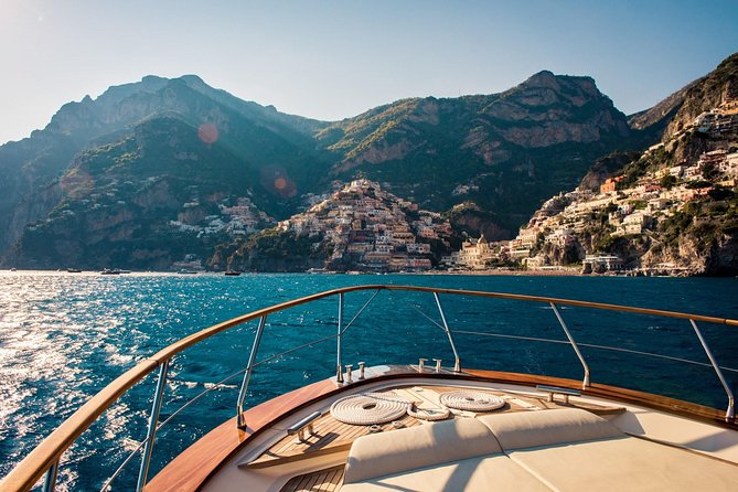 Day Trip to Amalfi Coast and Ieranto Bay in a Hybrid Eco Boat - Li Galli and the Amalfi coastline view that makes you forget your phone