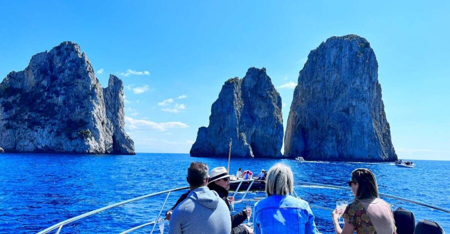 Discover Capri's Hidden Gems: Group Tour Boat Experience - The Arco Naturale and White Grotto moments