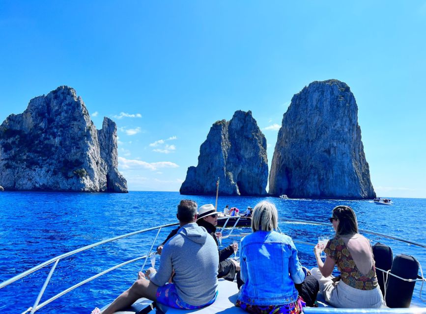 Discover Capri's Hidden Gems: Group Tour Boat Experience - Grotto stops: Green Grotto now, Blue Grotto only if it works