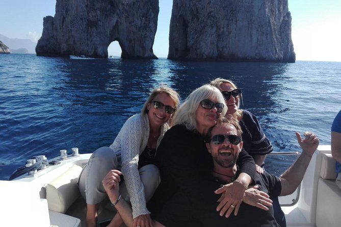 Excursion to Capri by shared boat departure from Sorrento - Sea Stacks, Cave Geometry, and Lighthouse-to-Cave Scenic Flow