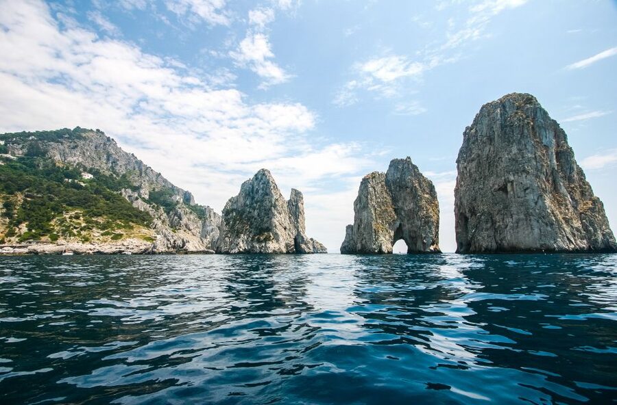 From Naples: Full day Capri Private Boat Tour - Cave time: Coral, White, Green Caves and the Blue Lagoon