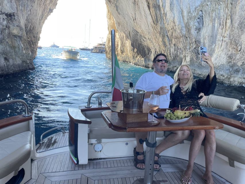 From Naples: Full day Capri Private Boat Tour - Capri on land: Piazzetta, Via Camerelle, and AnaCapri chairlift views