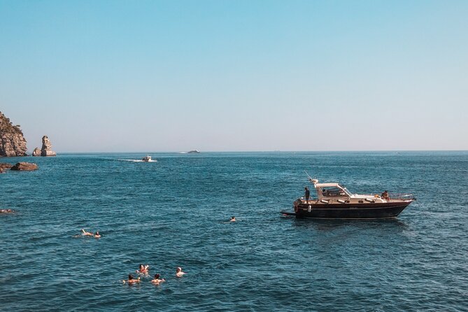 From Sorrento: Amalfi Coast Boat Tour up to 8 people - The scenic cruise: Roman ruins, marine reserves, and siren stories