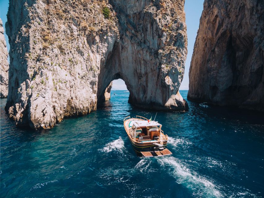 From Sorrento: Capri and Blue Grotto Half-Day Boat Tour - Capri by boat: cave time at Marvellous, White, Green, and the Blue Grotto