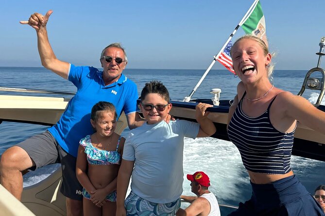 From Sorrento: Capri & Blue Grotto Boat Day Tour Up to 8 People - On-board comfort: Prosecco, fruit, masks, and what lunch will cost you