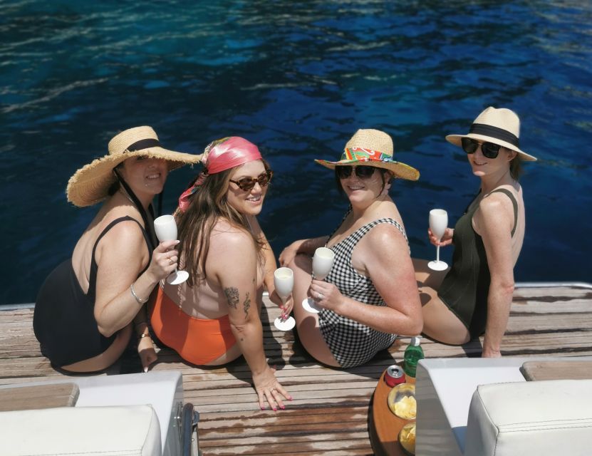 From Sorrento: Capri Boat Trip with City Visit & Swim Stops - Green Grotto and swim stops: snorkel gear, rocky coves, and sea reality