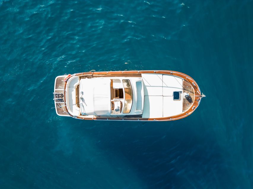 From Sorrento: Ischia and Procida Boat Tour with Snorkeling - Small-group comfort with included drinks, snack, and the skipper’s role