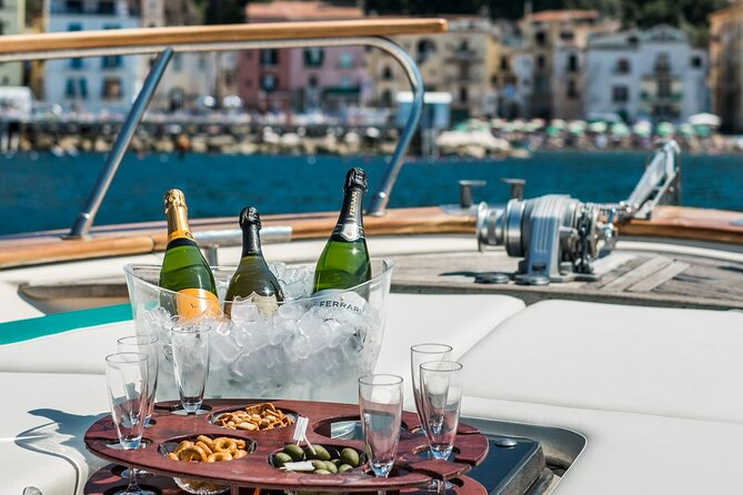 Full-Day Amalfi Coast Private Boat Tour from Sorrento or Positano - Sorrento Coast Cruising: Roman Villa, Punta Campanella, and Bay Time