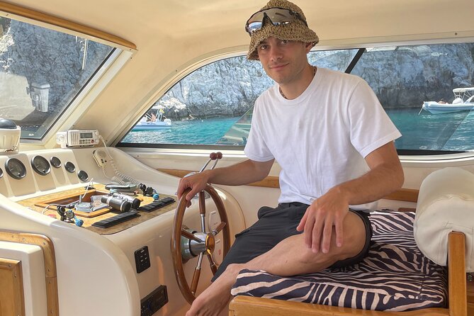 Full-Day Private Guided Boat Tour in Capri - Stop 1: I Faraglioni for crystal-clear water time