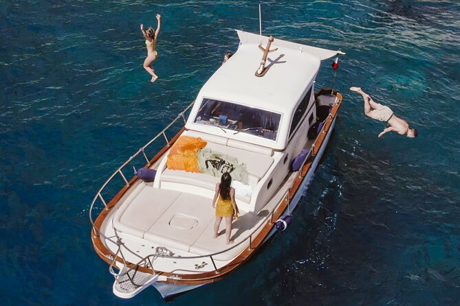 Full-Day Private Guided Boat Tour in Capri - Snacks, limoncello, prosecco, and the GoPro camera