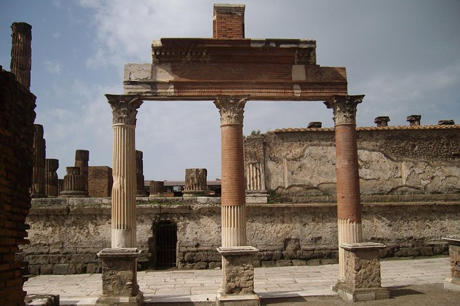 Guided Tour of Pompeii and Herculaneum with Lunch and Ticket - Neptune and Amphitrite mosaics, the Skeleton House, and the Augustales frescoes