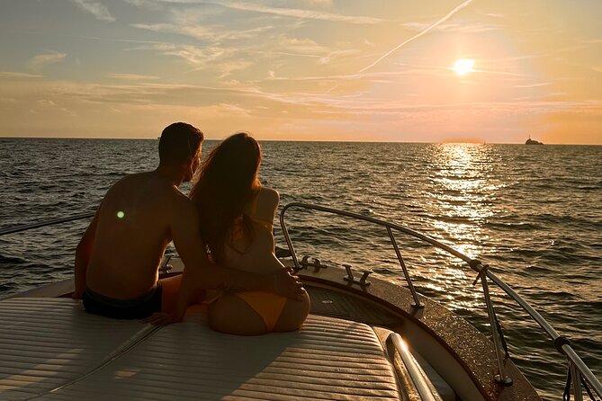 Luxury private boat tour to Capri and Blue Grotto on Gozzo 32 ft - I Faraglioni and the Natural Arch: Capri’s rock icons from the sea
