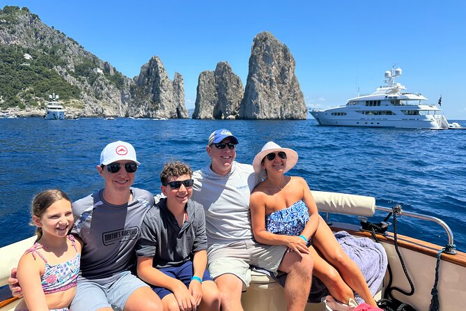 Luxury private boat tour to Capri and Blue Grotto on Gozzo 32 ft - Food, drinks, towels, and snorkeling: what’s actually included