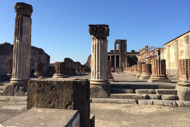 Pompeii-Vesuvius-Wine tour from Sorrento, licensed guide included - Mount Vesuvius hike: timed tickets, crater edge views, and weather reality