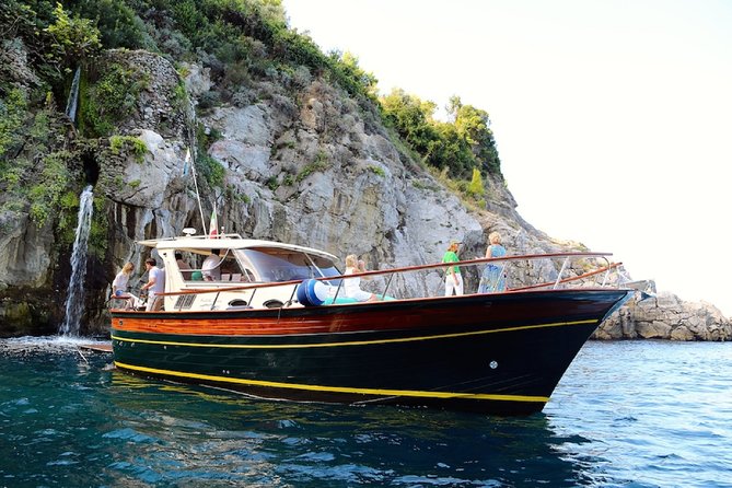 Positano & Amalfi Boat Tour from Sorrento: Swim & Light Lunch - Li Galli swim stop: the sirens stop you actually get to enjoy