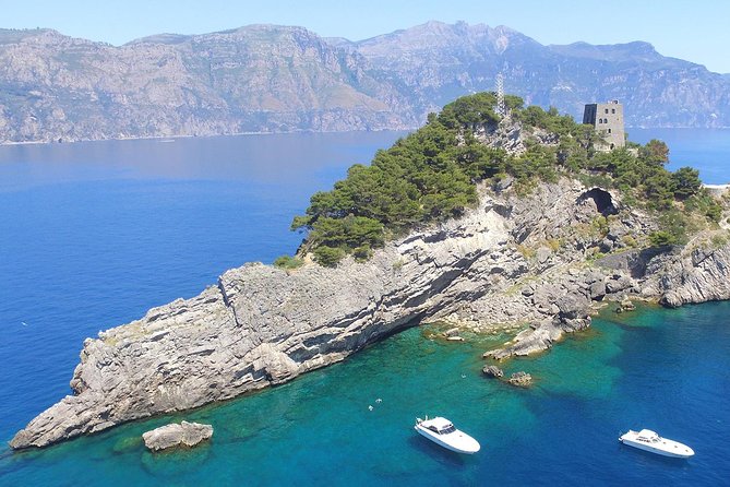 Private Boat Excursion from Sorrento to Capri and Positano - Capri’s lighthouse, a private villa angle, and the kind of views that come from being at sea
