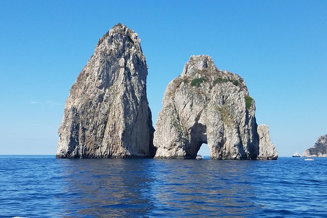 Private boat excursion to Capri from Sorrento - 7 hours - Faraglioni, the big natural arch, and the Madonna-shaped cave