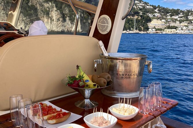 Private Boat Tour of Capri From Sorrento on Sorrentine Gozzo - Capri on land: Piazetta time plus Via Krupp, Giardini di Augusto, Via Tragara
