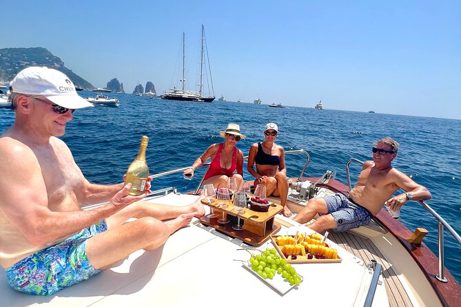 Private Capri Boat tour BEST SELLER - Marina Piccola and Faraglioni: Yachts, the Love-Story Rocks, and Photo Views