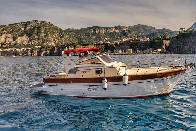 Private Tour to Capri & Positano from Sorrento Classic Gozzo 850 - Capri by Boat: White Grotta, Faraglioni Pass, Punta Carena, and the Natural Arch