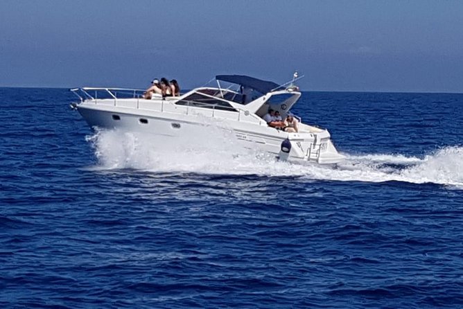 Shared boat tour from Sorrento to discover Capri - Villa Jovis from the boat: Tiberius, government, and cliffside drama