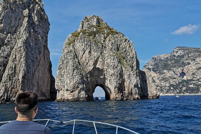 Shared boat tour from Sorrento to discover Capri - Main port pass and the decision around the Blue Grotto