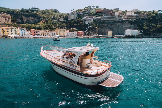 Shared half-day boat tour to Capri from Sorrento - Capri From the Sea: Grottos, Faraglioni, and Punta Carena Views