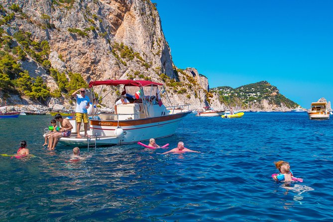 Small Group Boat Day Excursion to Capri Island from Sorrento - Faraglioni: the rock formation you should see from the water