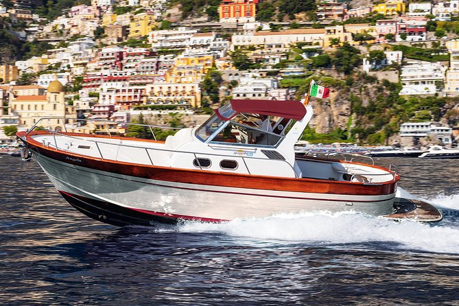 Small Group Boat Day Excursion to the Amalfi Coast from Sorrento - Positano for 1.5 hours: steps, boutiques, and sandals on narrow streets