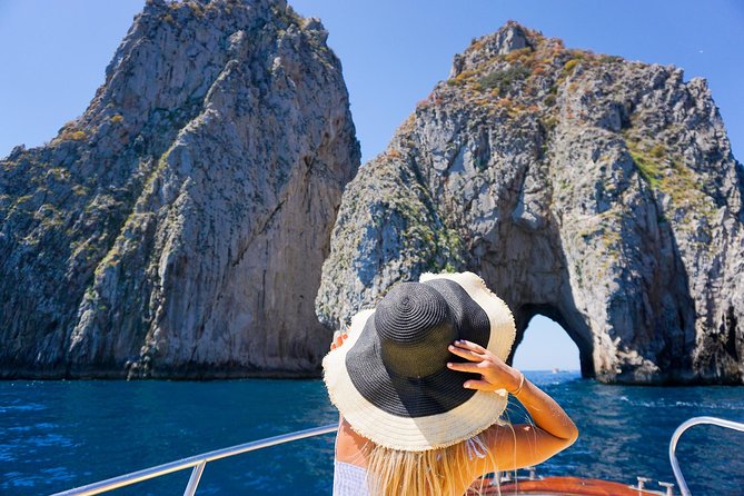 Small Group Boat Tour Capri & Blue Grotto with Swimming Stops - Sorrento coast stops that set the scene before Capri