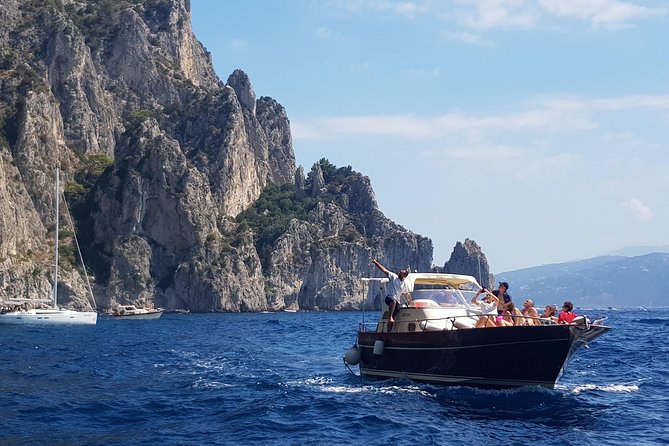 Small-Group Capri and Blue Grotto Boat Tour from Sorrento 5 Hours - Stop 1, Blue Grotto: The World-Famous Stop With Real-Time Limits