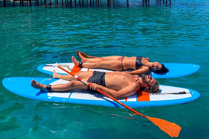 Small group paddle boarding tour to Bagni Regina Giovanna - Marina Grande start: lesson first, then you actually go