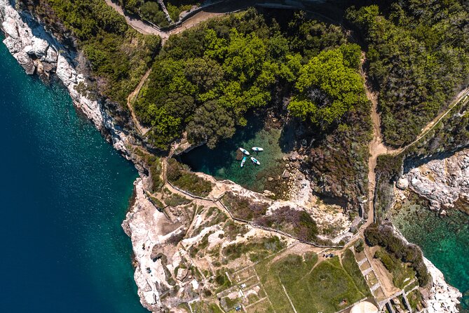 Small group paddle boarding tour to Bagni Regina Giovanna - Swimming time, waves, and the practical side of SUP comfort