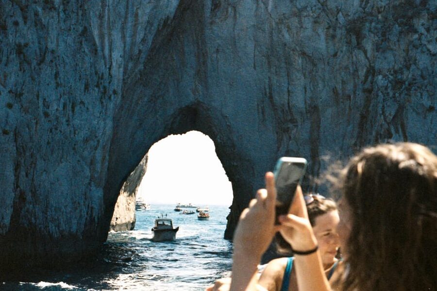 Sorrento: Capri and Blue Grotto Yacht Tour with Snorkeling - Faraglioni, Punta Carena Lighthouse, and Arco Naturale: Your Best Photo Route